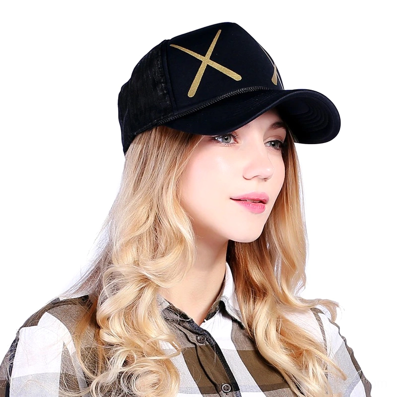 Woman wearing black gothic XX mesh baseball cap with golden cross print, side profile portrait showcasing fit and alternative style aesthetic