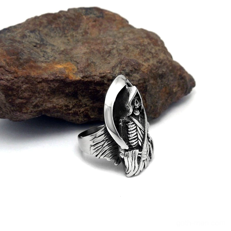 Grim Reaper gothic skull ring low side angle heavy metal texture scythe detail on rock