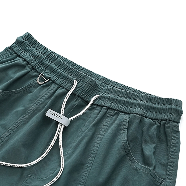Close-up detail of gothic harem cargo pants waist showing drawstring mechanism and elastic waistband construction