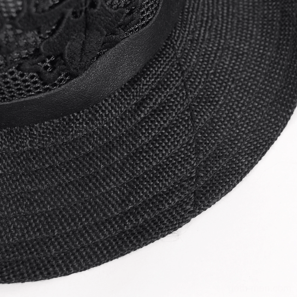 Black gothic cowboy hat with intricate skull lace and metal spike details, alternative fashion styling