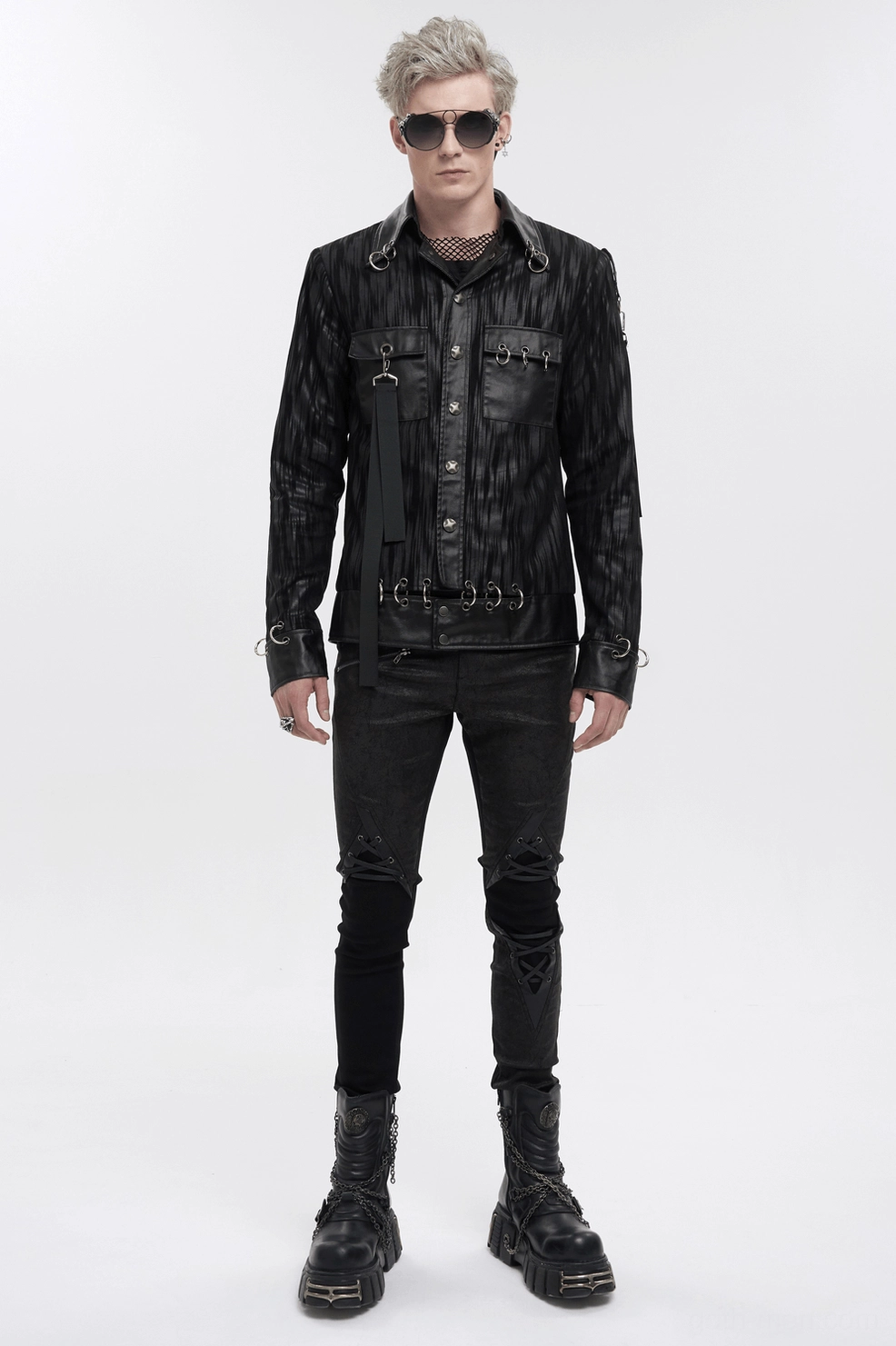 Close-up detail of metal hardware, cuffs, and industrial accents on gothic jacket