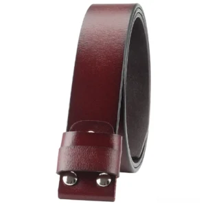 Wine red leather belt strap side detail showing decorative silver metal studs on keeper, premium cowskin texture close-up