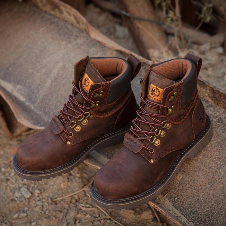 Men's dark brown leather lace-up combat boots with metal hardware - detail shot showing craftsmanship and alternative fashion styling potential