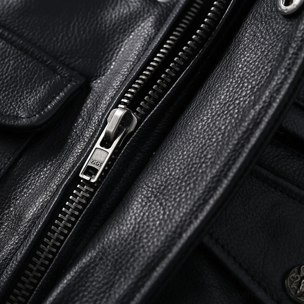 Front zipper closure with matte metal hardware on pebbled black leather gothic jacket