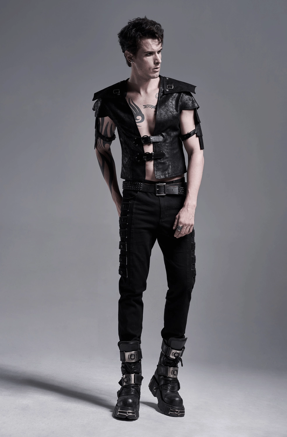 Close-up of gothic leather vest strap adjustment system and buckle mechanics