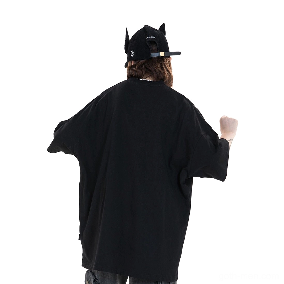 Black gothic oversized tee back view on male model with cap