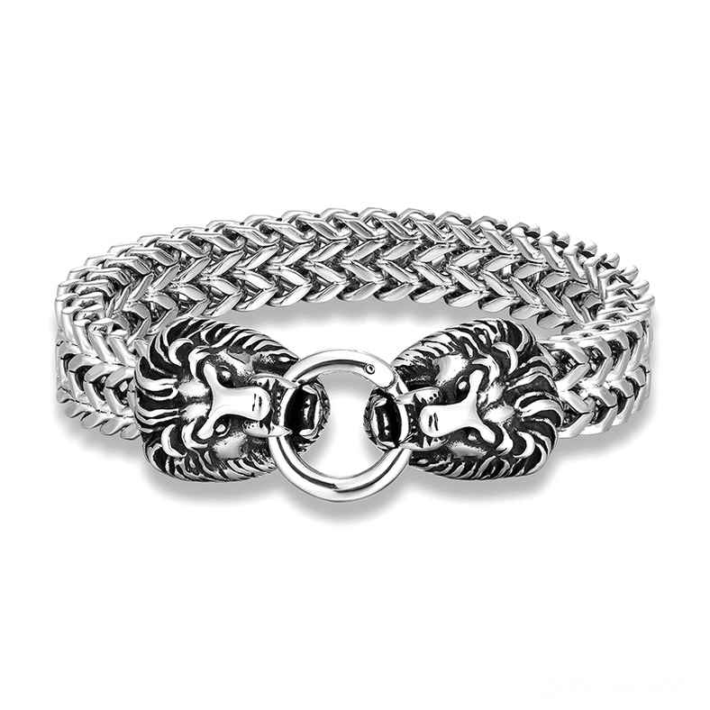 Dual lion head stainless steel gothic punk bracelet with woven curb chain, silver finish, top-down flat lay view