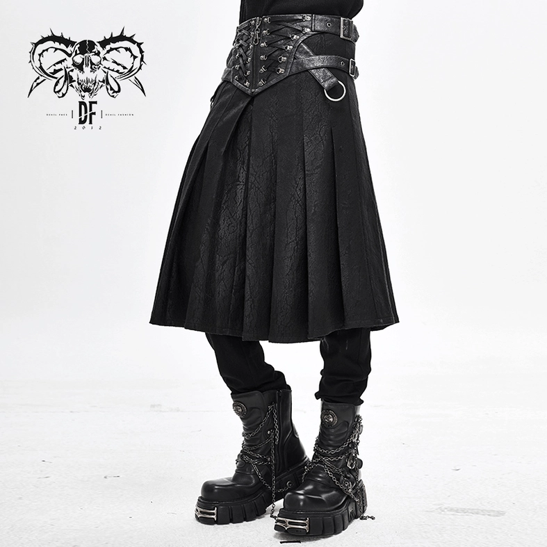 Full body model wearing black asymmetric kilt with industrial metal rivets and leather accents