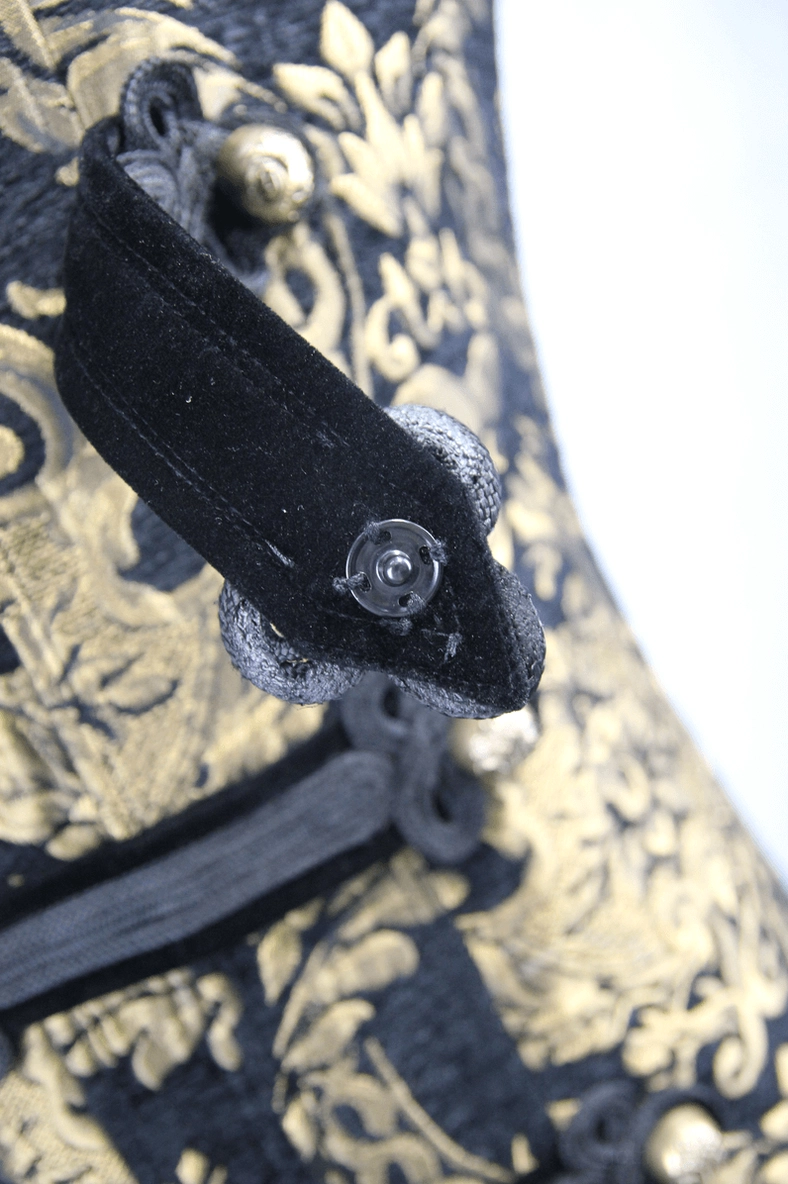 Men's gold embroidered sleeveless gothic coat featuring ornate damask pattern and fitted silhouette