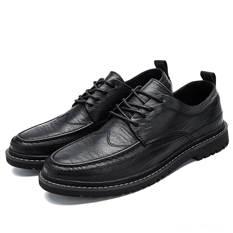 Men's black split leather gothic derby shoes with lace-up closure and non-slip rubber sole, three-quarter view on white background