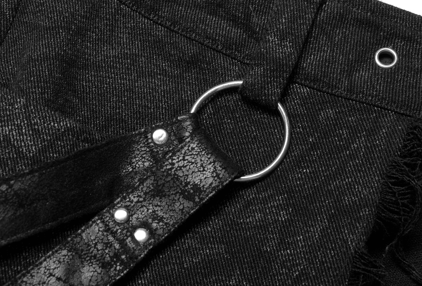 Black gothic kilt wearing demonstration showing fitted cut, asymmetric frayed hem, and adjustable harness on male model