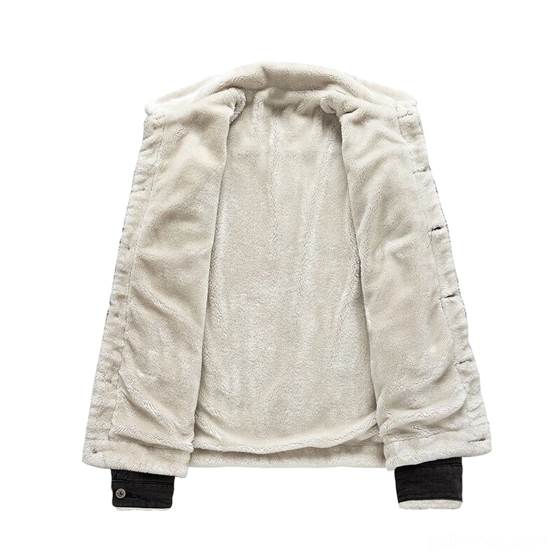 Men's denim jacket interior sherpa fleece lining flat lay showing soft plush texture and tailored sleeve cuffs