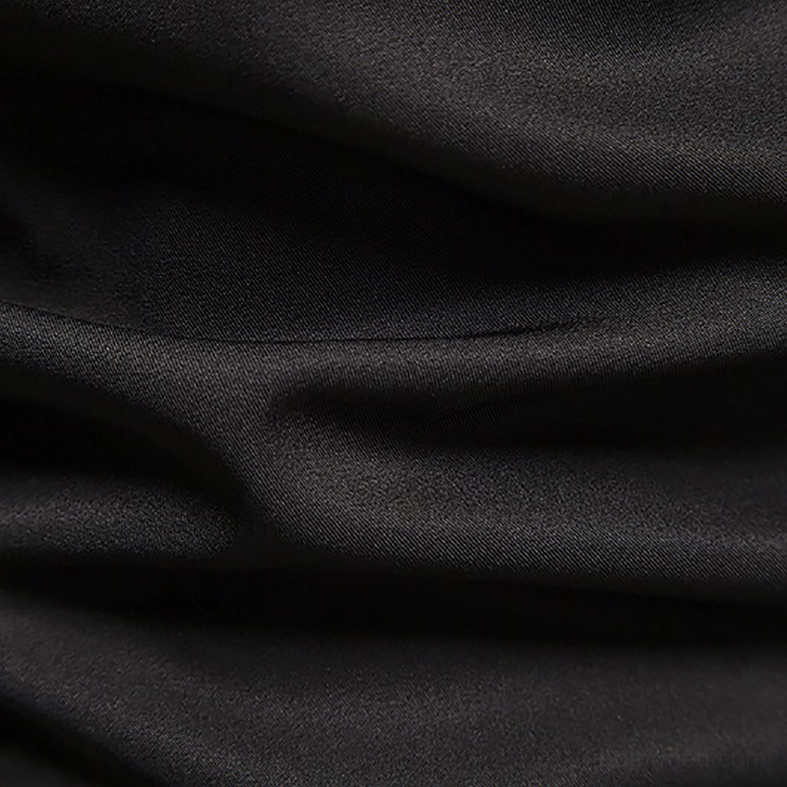 Men's gothic asymmetric shirt detail view showing button placement and fabric quality