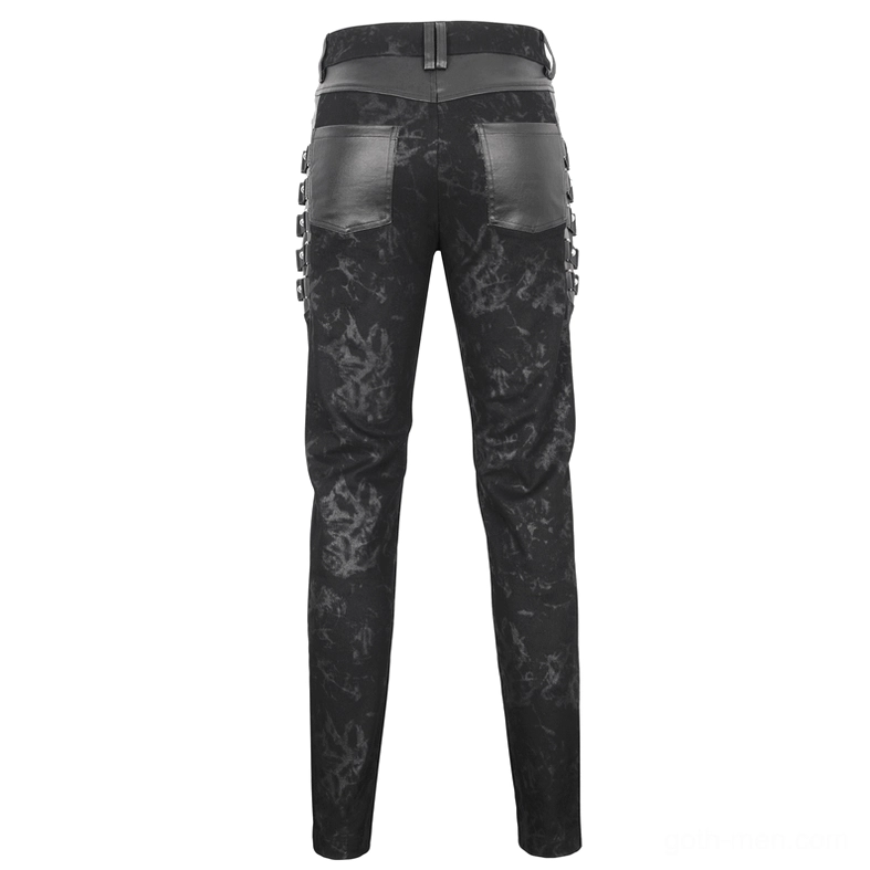 Rear full-body view of black gothic men's trousers showing dual hip buckled straps and leather back pocket patches