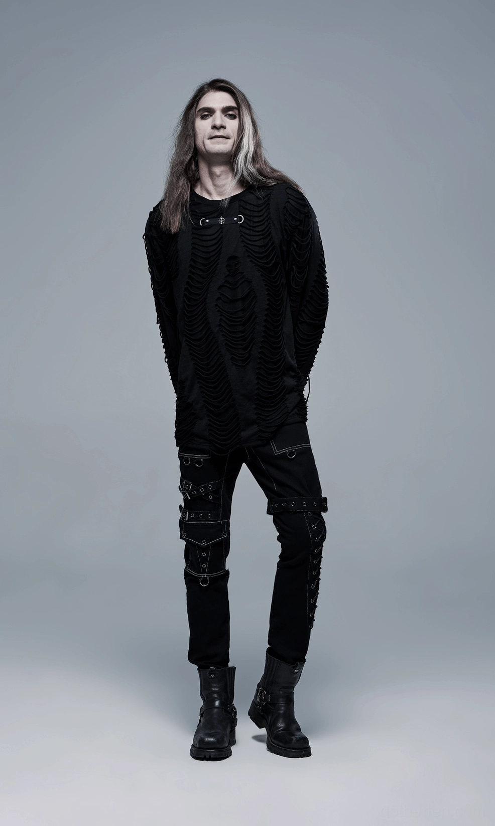 Men's black gothic cargo pants with buckled straps and industrial design elements