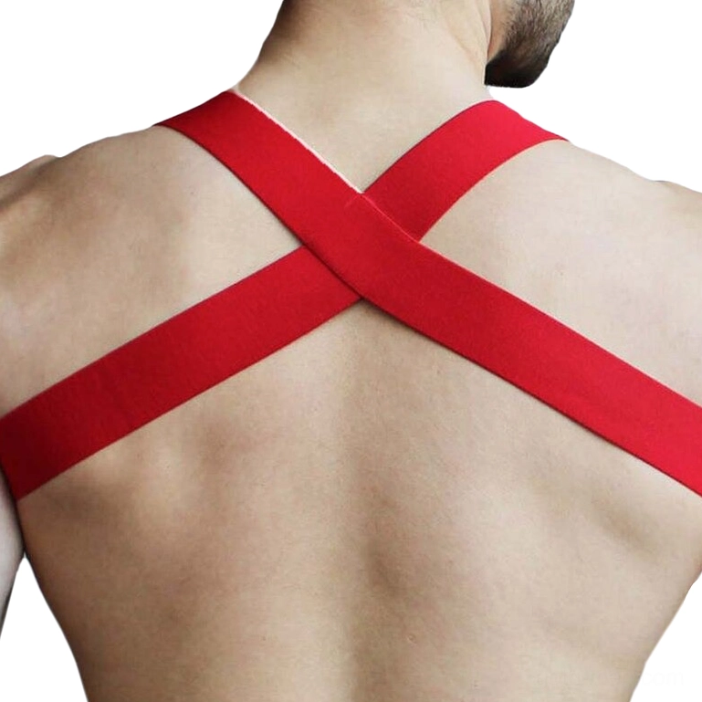 Red faux leather chest harness back view showing vibrant red elastic shoulder straps and cross-back design on male torso