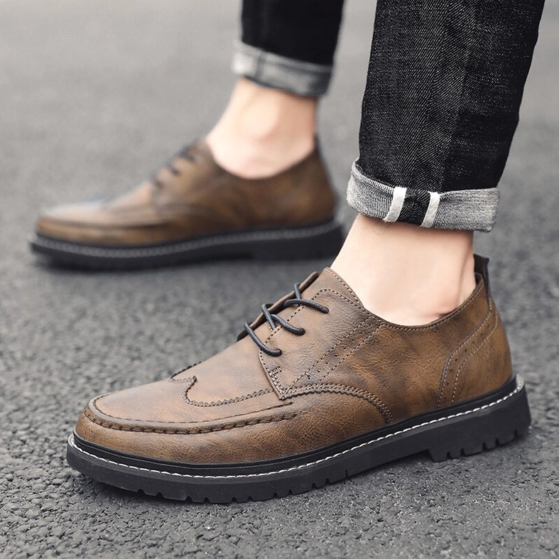 Premium gothic men's leather lace-up derbies lifestyle shot showing contemporary dark aesthetic appeal