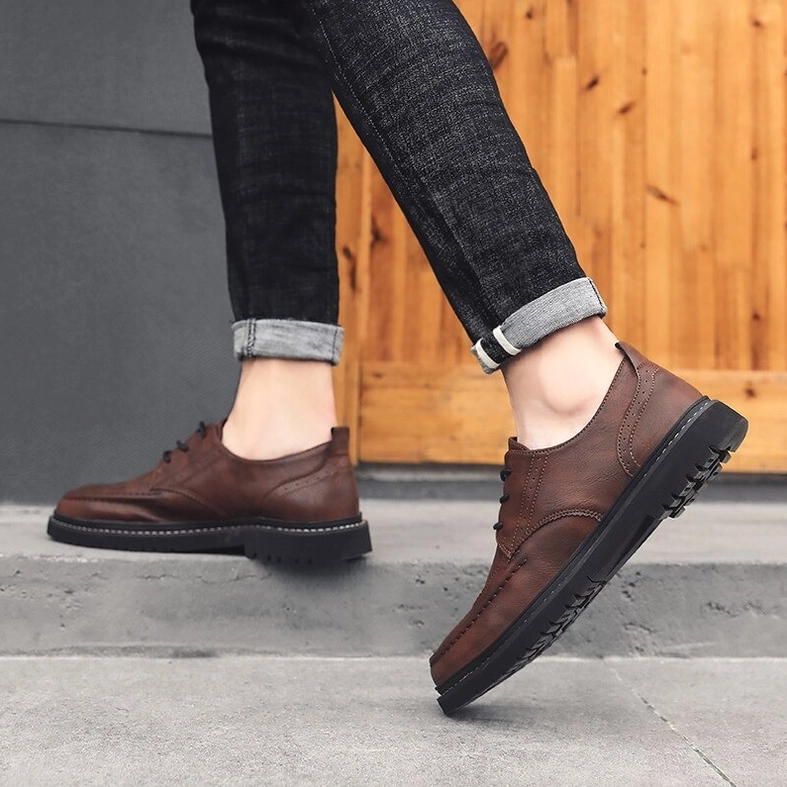 Gothic men's leather dress shoes angle view highlighting refined low-top silhouette and Italian design