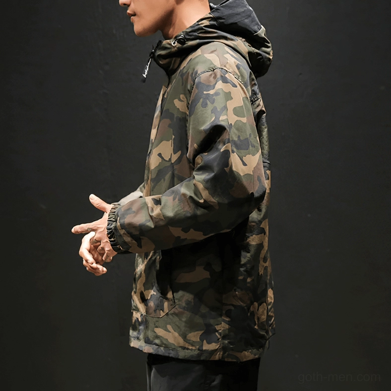 Male model front facing camo and black half-zip gothic military pullover hoodie with drawstring