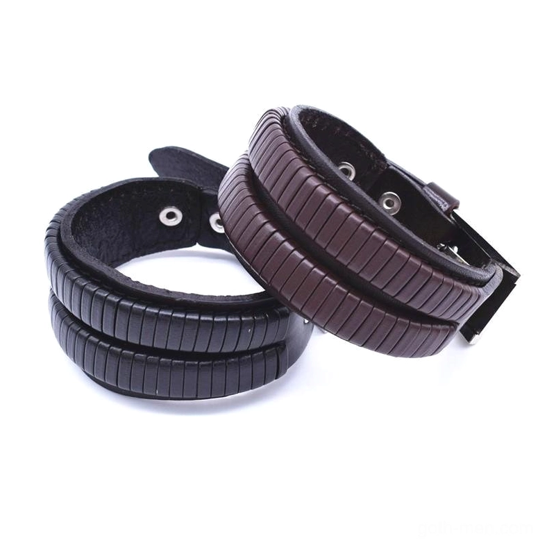 Double-wide leather cuff bracelet for men in black and brown with striped embossed pattern, adjustable metal holes, flat front view