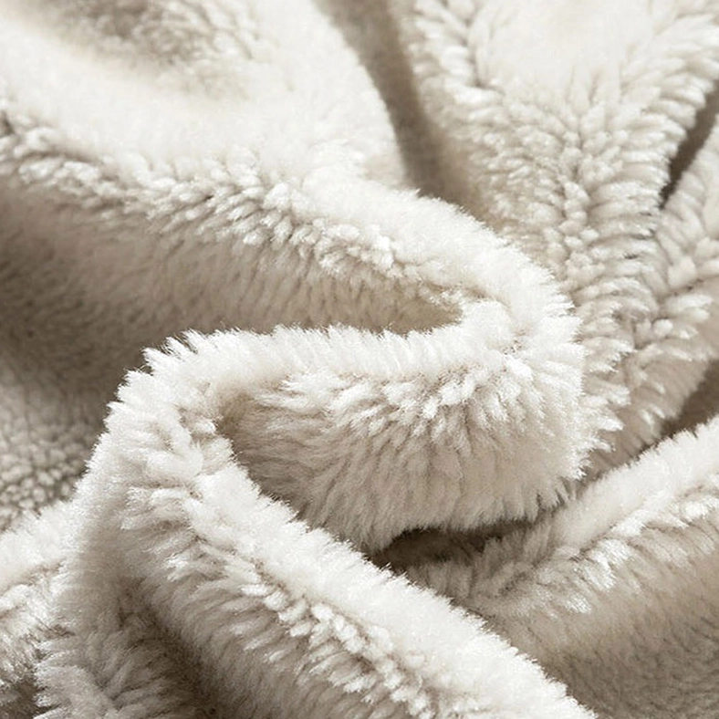 Men's sherpa fleece lining macro closeup shot showing thick soft plush pile texture in off-white color