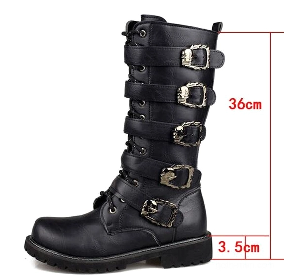 Single black gothic combat boot side profile showing 36cm mid-calf height with skull buckle hardware