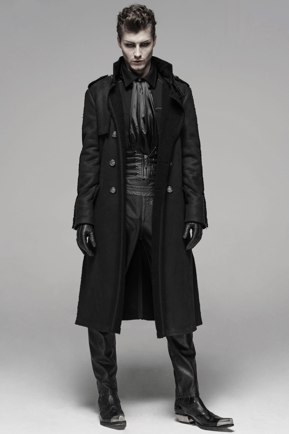 Black military gothic long coat front styling showing authoritative presence and formality