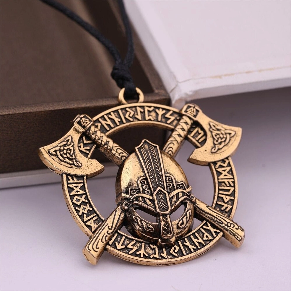 Silver stainless steel gothic pendant with Norse axe and helmet design on burlap