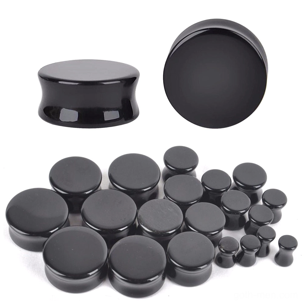 Multiple size obsidian ear gauges set black stone flesh plugs gothic collection flat lay