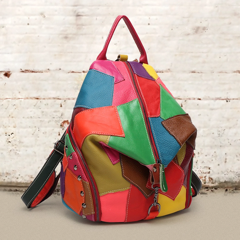 Multicolor studded leather Gothic backpack with contrast hardware and adjustable straps