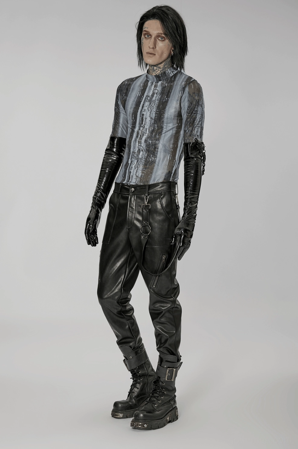 Black shiny patent leather gloves detail view highlighting ruched cuff design, elasticity, and premium material finish
