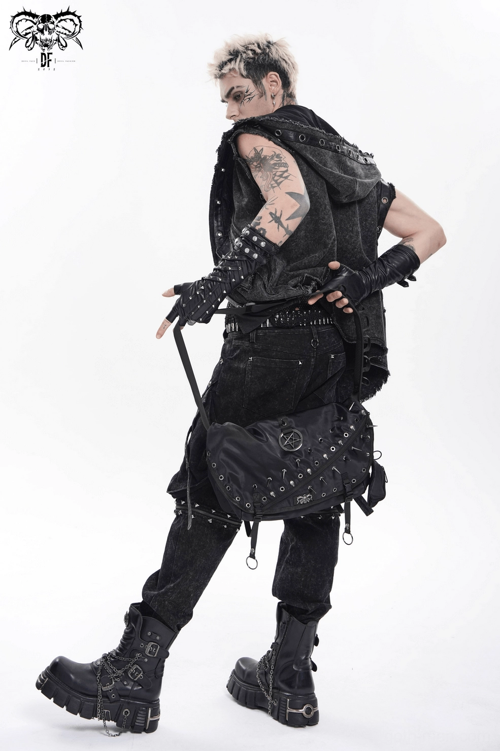 Pentagram charm and spike stud arrangement pattern on front flap of black gothic bag
