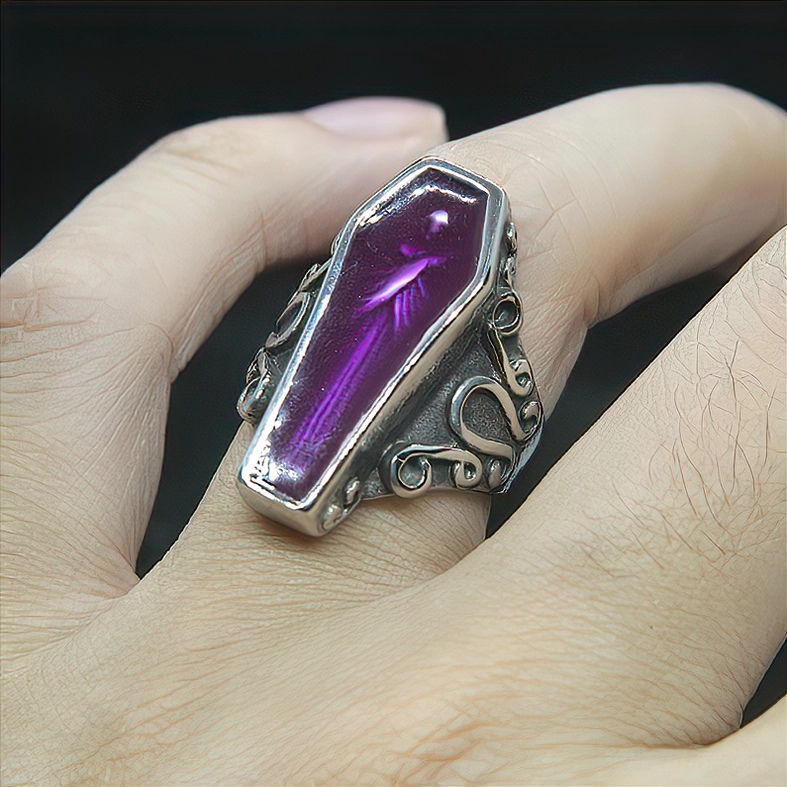 Purple coffin mummy ring worn on hand showing real wearing effect and gothic aesthetic in close-up