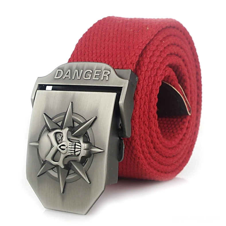 Red punk canvas gothic belt with silver spiked DANGER skull buckle, oblique studio shot
