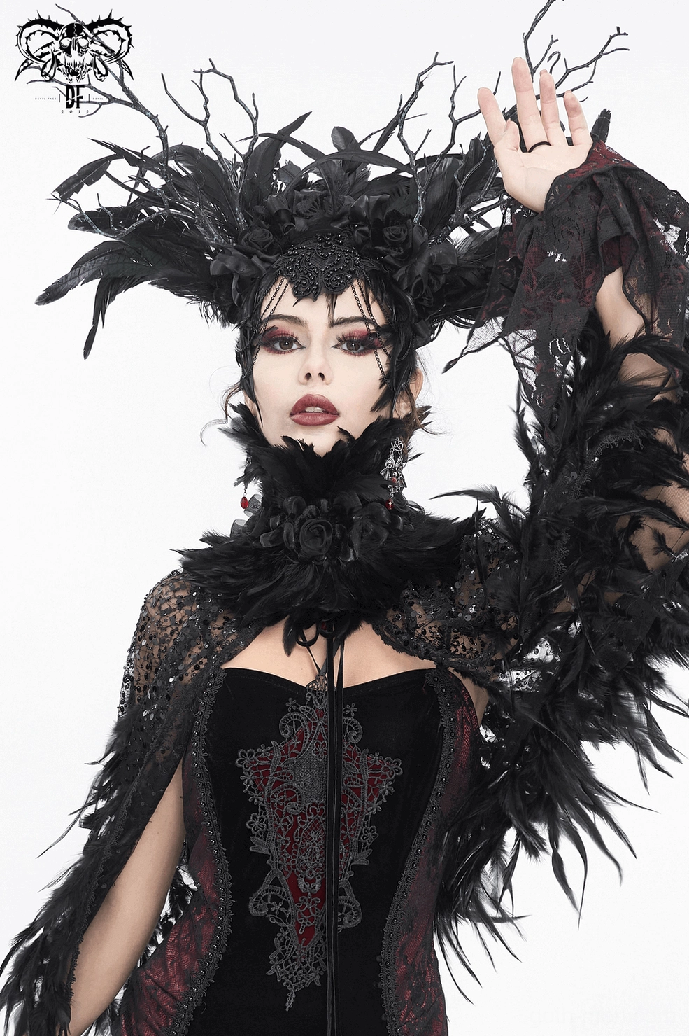 Romantic gothic feather collar design with fabric blooms styling inspiration