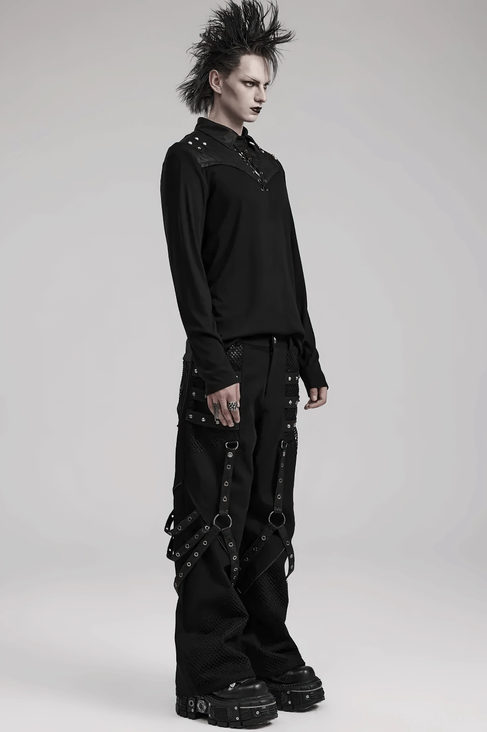 Side seam detail revealing mesh construction, strap attachment points, and industrial hardware