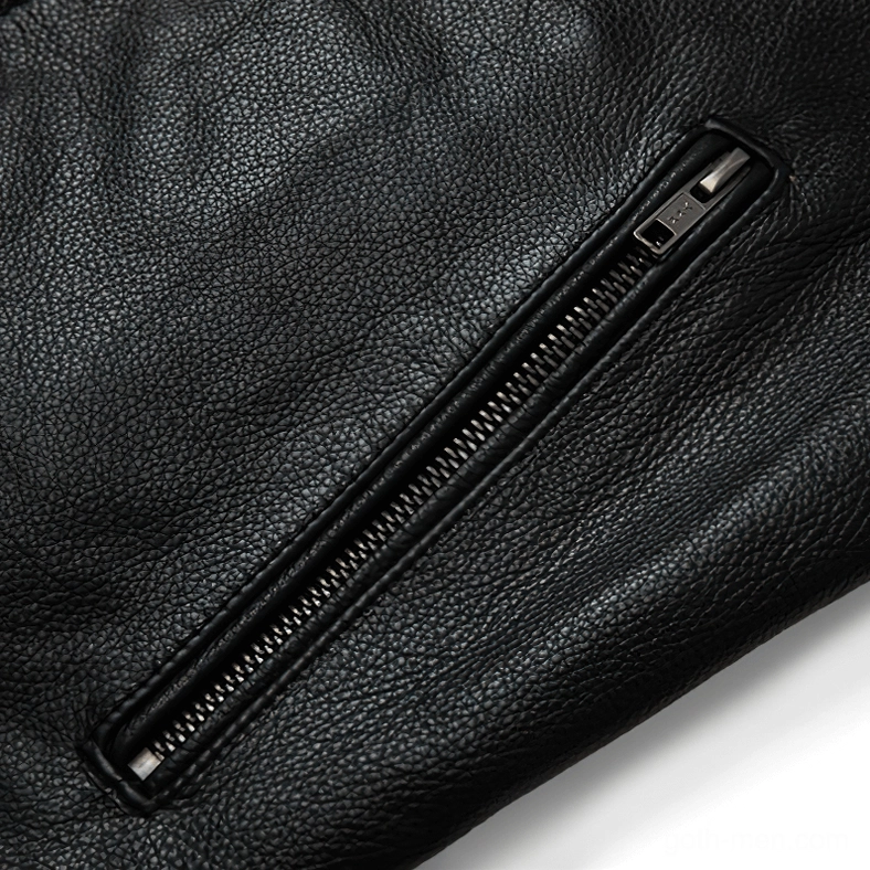 Side zipper pocket detail on black genuine leather gothic motorcycle jacket