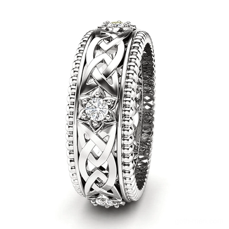 Silver Celtic knot zircon gothic ring with beaded rim and interwoven Celtic pattern, side oblique view showing radiant cubic zircon center stone
