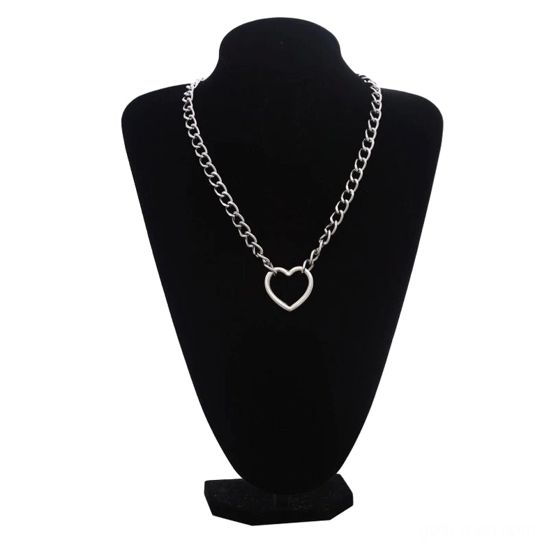 Silver hollow heart gothic chain necklace displayed on black jewelry mannequin, polished silver curb chain with hollow heart pendant front view