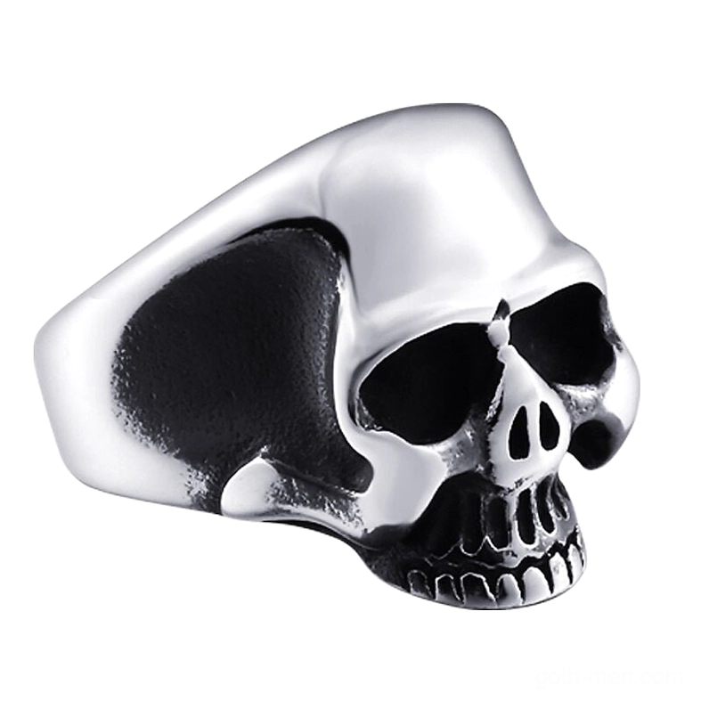Silver stainless steel skull ring with bright polished finish, detailed skull facial features visible from three-quarter angle on white background