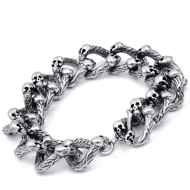 Double-row gothic skull bracelet flat lay top view highlighting multiple skulls embedded throughout twisted chain links antique silver tone
