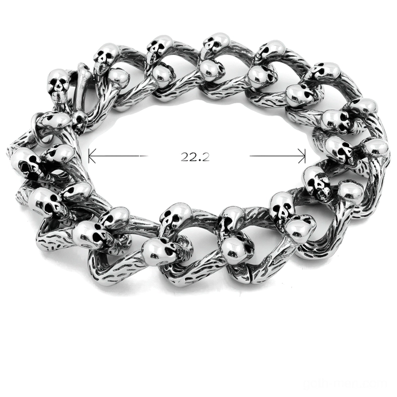 Gothic punk skull chain bracelet overhead view displaying 22.2cm length measurement and dense skull decoration on curb link structure