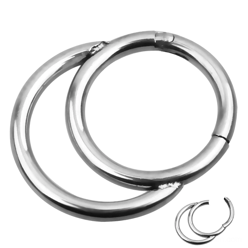 Silver surgical steel hinged segment nose clicker ring close-up product shot with polished steel finish