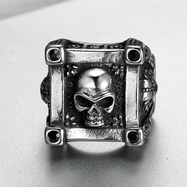 Square frame gothic skull ring front view, antique silver stainless steel with four corner black faux gems