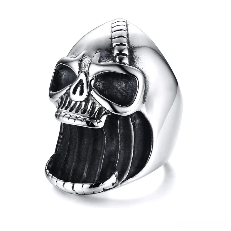 Silver stainless steel skull bottle opener ring with detailed carved face, front view on white background