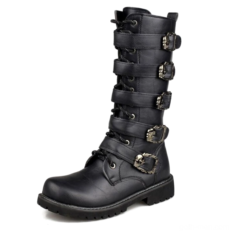 Single black leather gothic boot displaying rugged rubber sole and skull buckle decoration