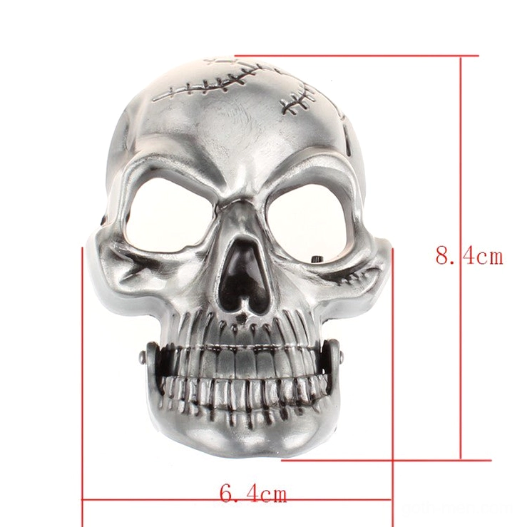 Closeup detail of large silver skull buckle showing hand-stitched engravings, 8.4cm height 6.4cm width