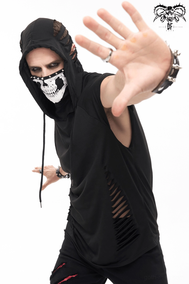 Black gothic hoodie with skull hood print styled on model in alternative fashion setting