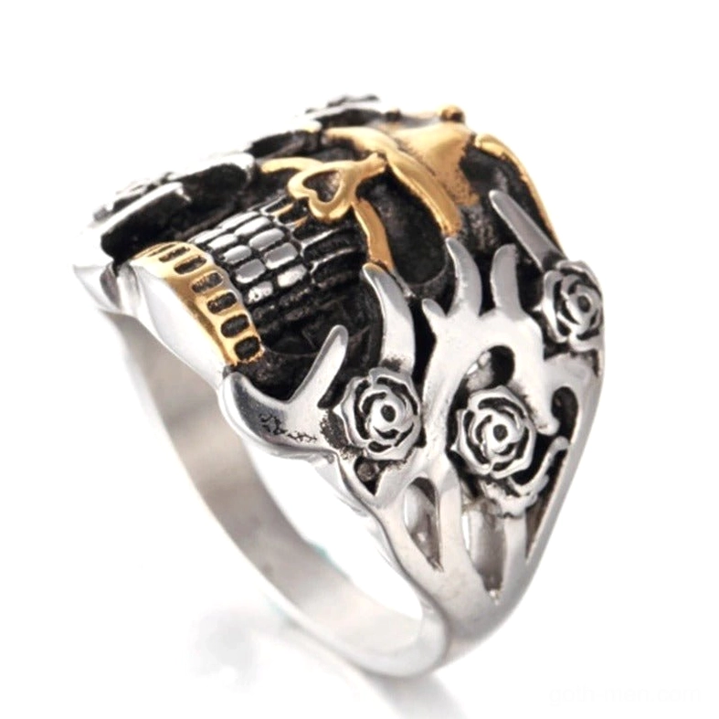 Gothic skull ring rear view displaying gold-trimmed skull jaw and rose band decorations, two-tone silver and gold alternative fashion jewelry