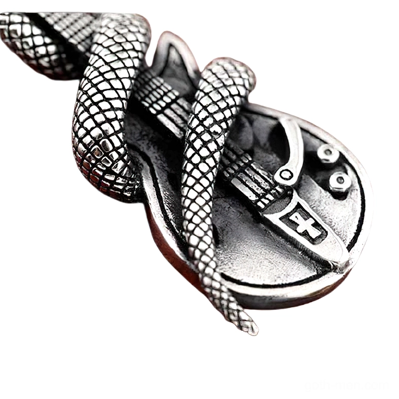 Close-up macro overhead view of snake guitar pendant showing hardware and scale details